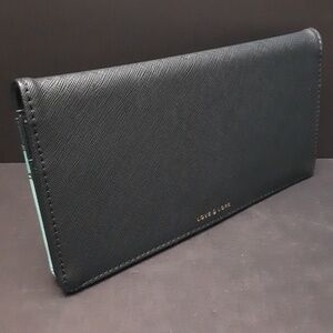 Love & Lore Women's Black/Teal Travel Passport Wallet.